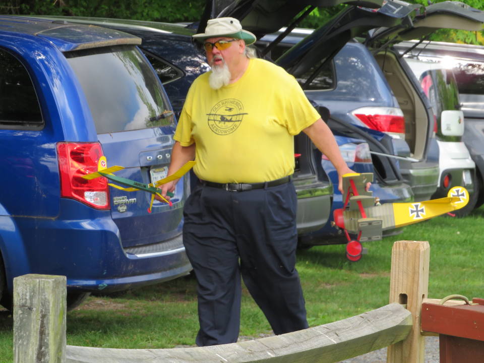 Club member walking with planes