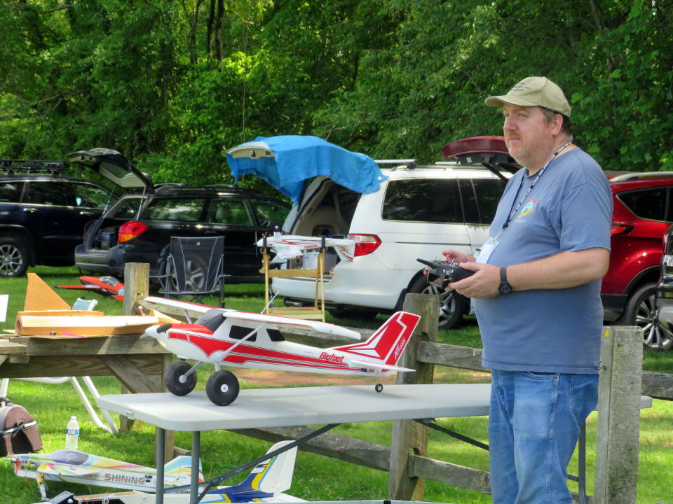 club member prepping plane